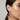 Pink balloon dog-shaped earrings on a white background