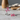 Pink balloon dog-shaped earrings on a white background