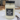Hand-poured soy candle for dog moms on a cozy table