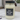 Close-up of Best Dog Mom Ever candle label in rustic packaging, gift-ready