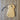 Cute dog-shaped ornament on a wooden background.