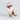 Dog wearing the pink Dog Birthday Hat with "Happy Birthday" and colorful candles on top.