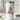 White tumbler with a Christmas tree design featuring cats on a light gray background.