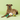 Dog with a bee-themed toy on a green background