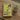 Book cover with illustrations of dogs and text on a green background